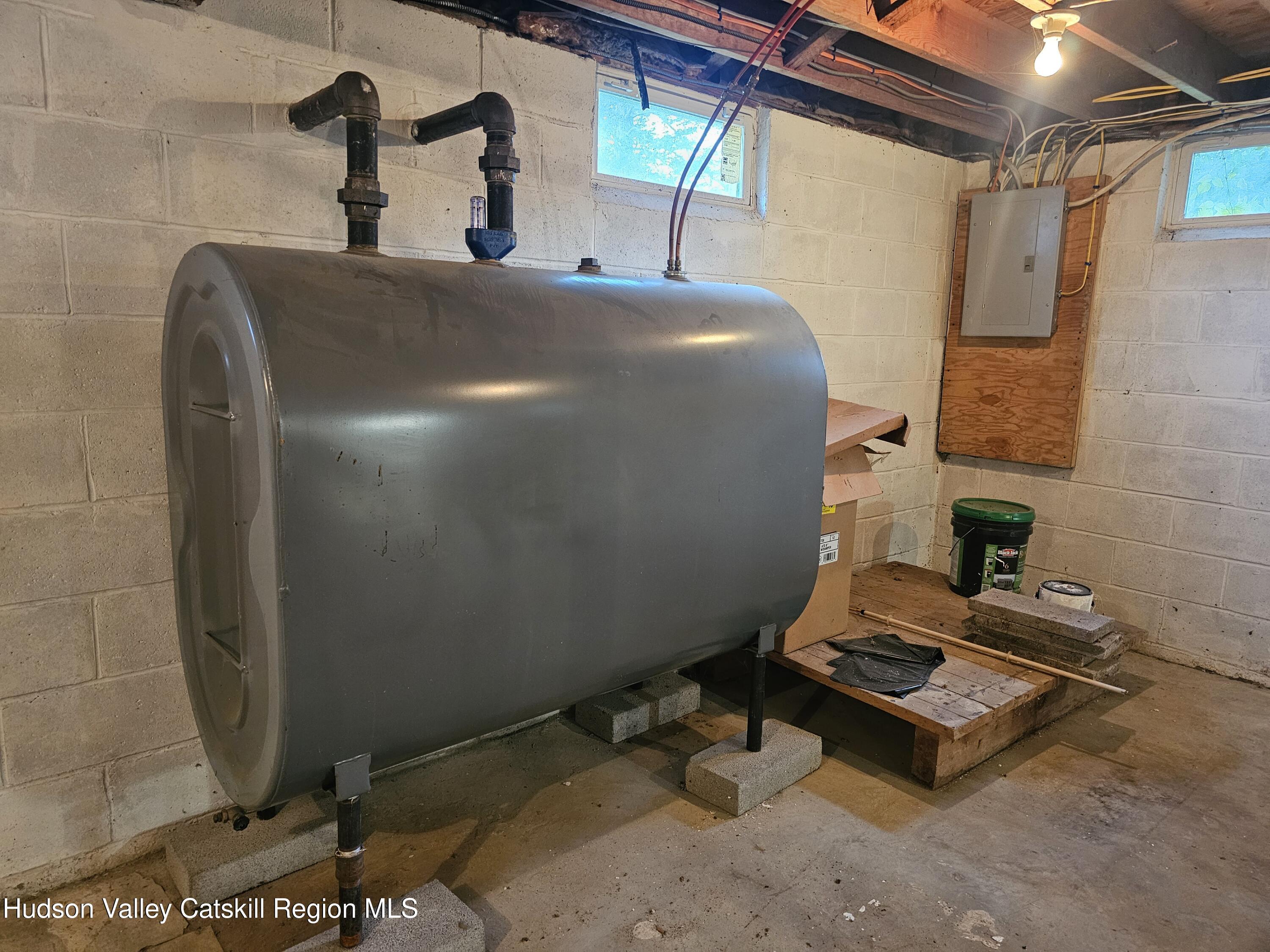10 Amherst Road Red Hook, NY 12571 - Photo 19 of 20 a room with water heater and a wooden door