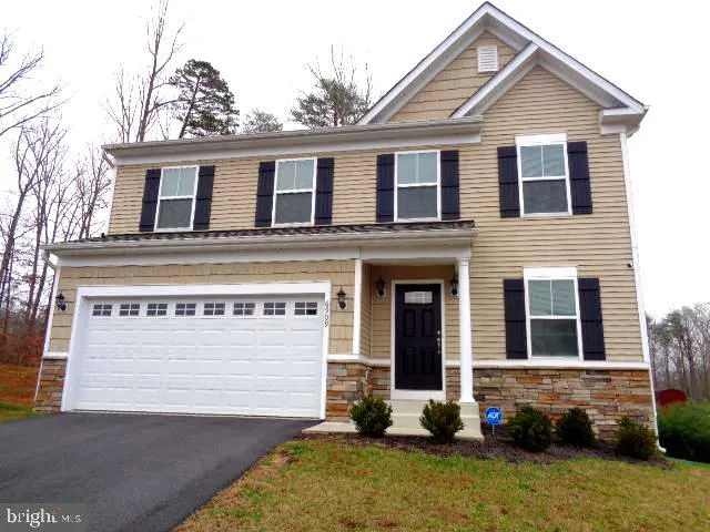 a backyard of a house with potted plants
