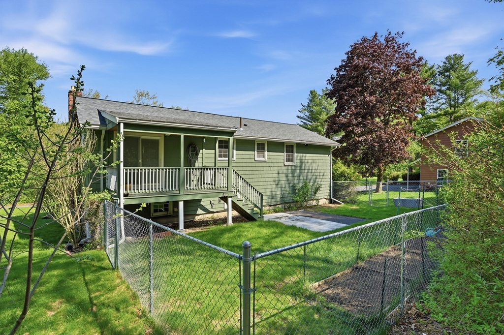 33 Simon Willard Road Acton, MA 01720 - Photo 34 of 42 a view of a house with backyard