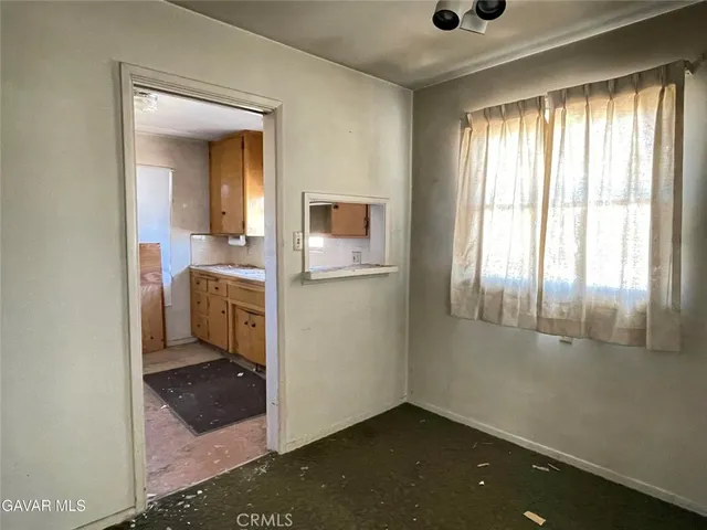 a utility room with cabinets