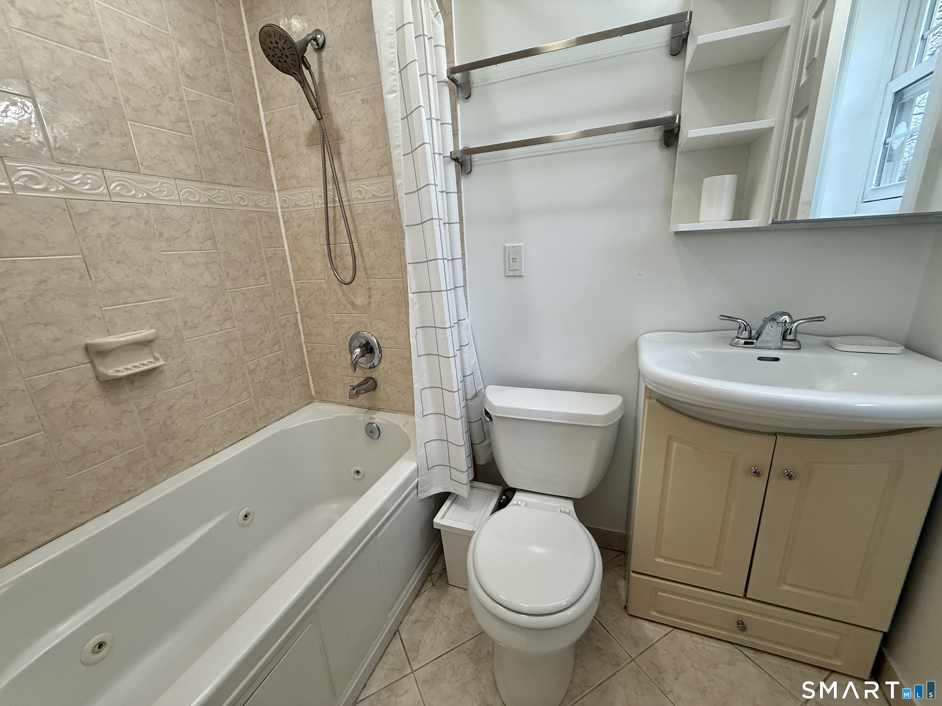 70 Renwick Place Bridgeport, CT 06604 - Photo 18 of 20 a bathroom with a sink toilet and shower