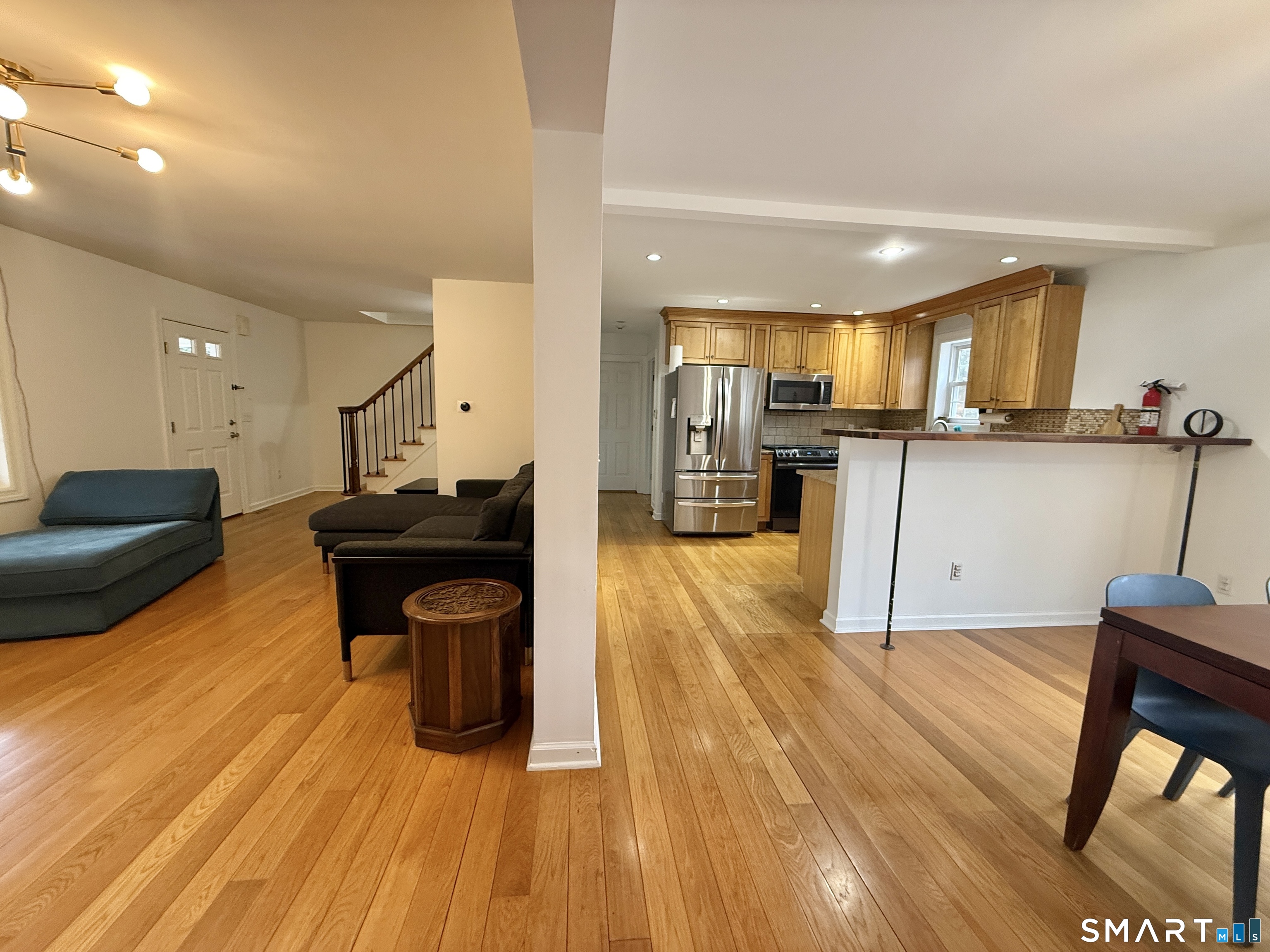 70 Renwick Place Bridgeport, CT 06604 - Photo 6 of 20 a kitchen with a sink appliances and cabinets
