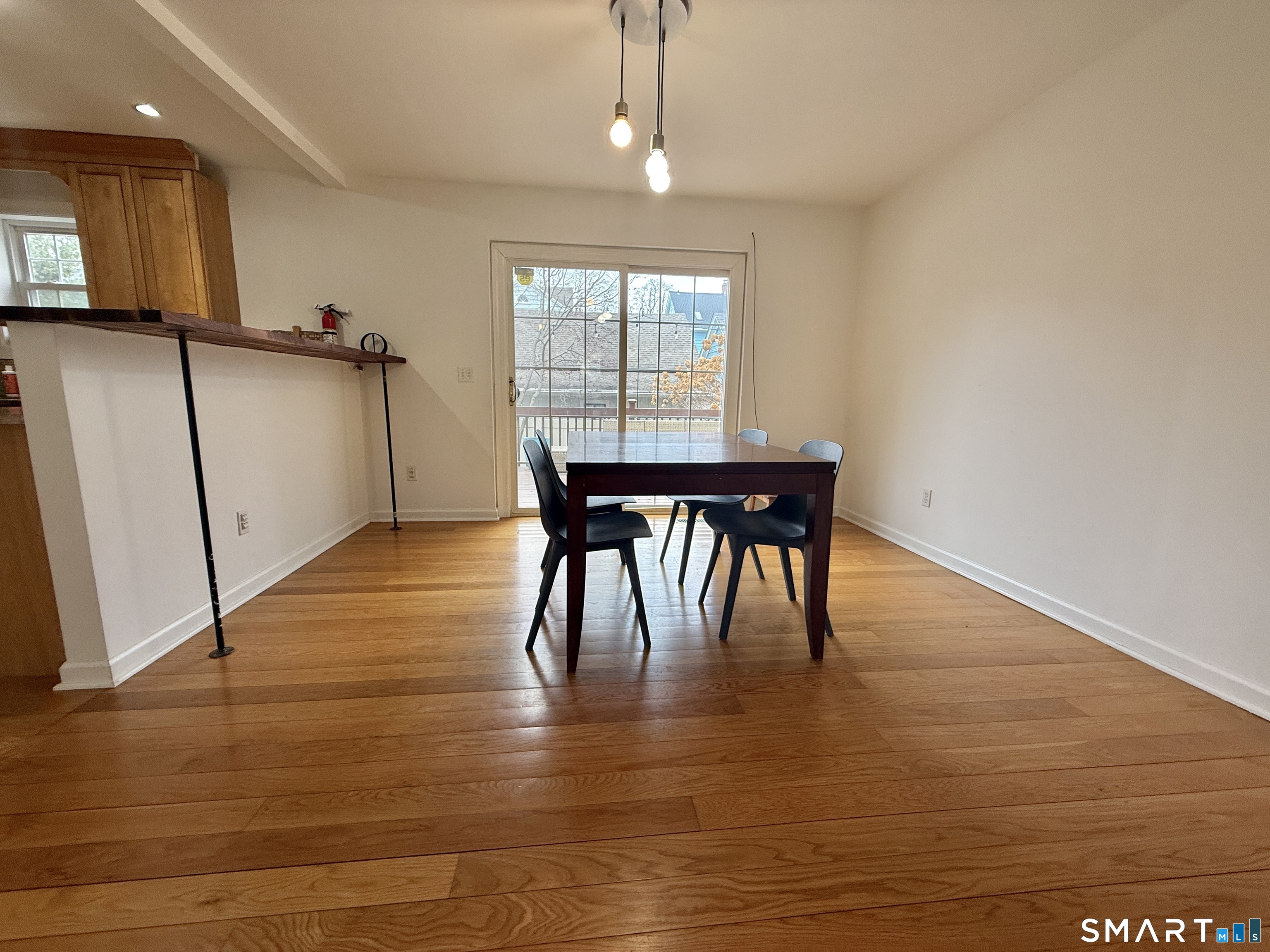 70 Renwick Place Bridgeport, CT 06604 - Photo 7 of 20 a view of a dining room with furniture window and wooden floor
