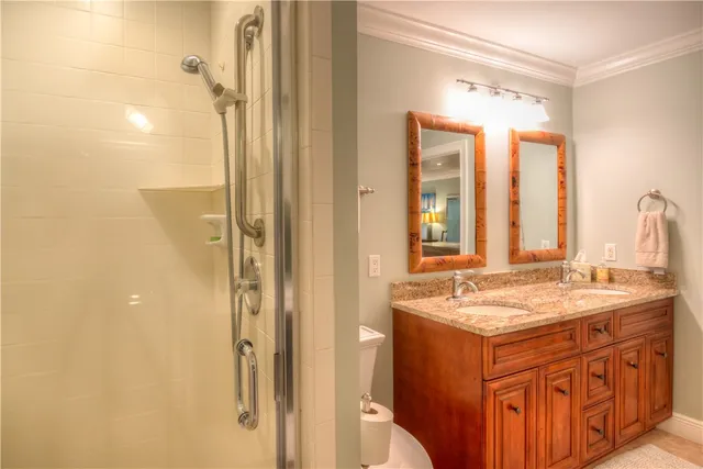 a bathroom with a sink a mirror and a shower