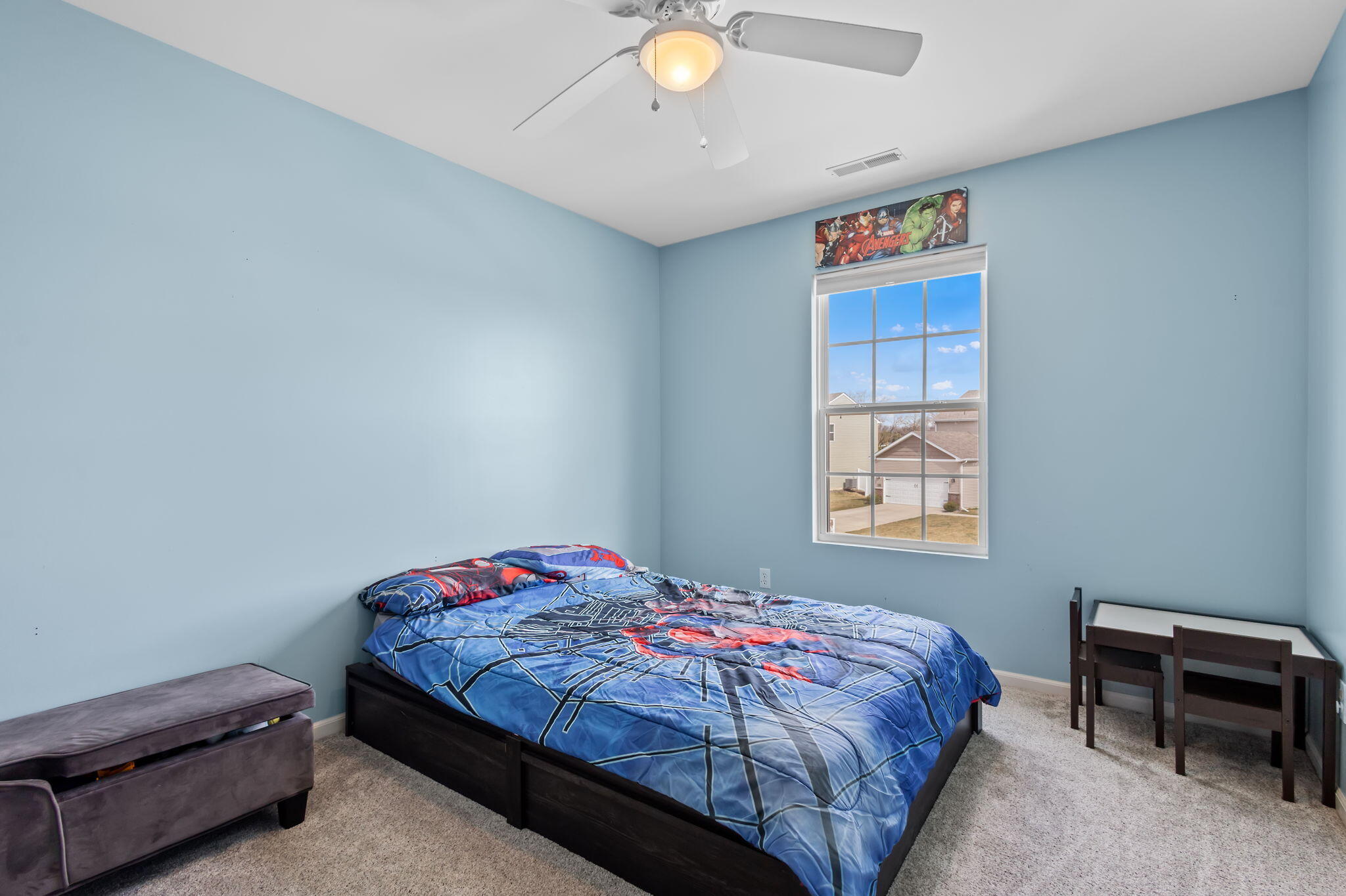 12938 Hayes Street Crown Point, IN 46307 - Photo 19 of 33 a bedroom with a bed and a window