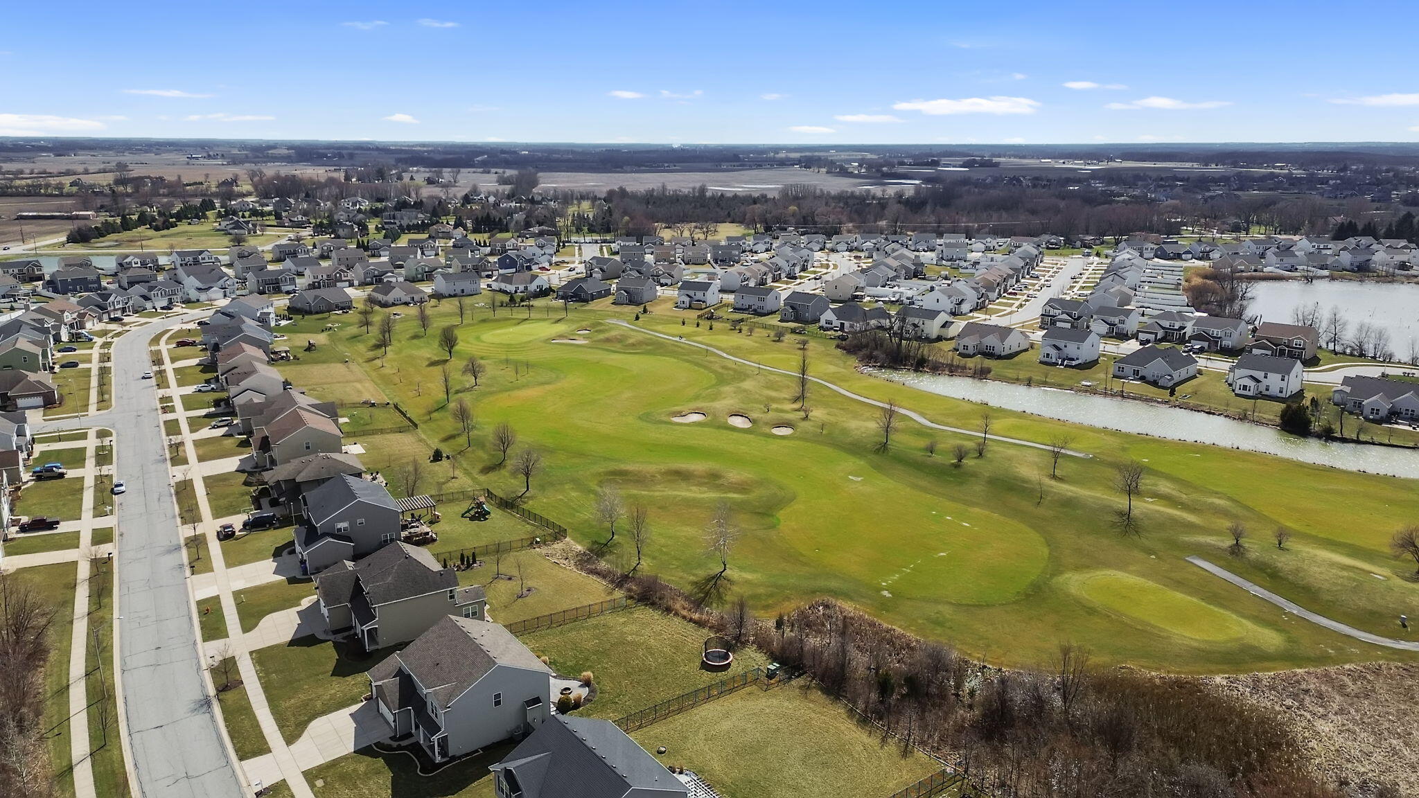 12938 Hayes Street Crown Point, IN 46307 - Photo 31 of 33 an aerial view of residential houses with outdoor space