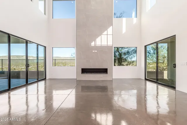 a bathroom with a bathtub and mirror