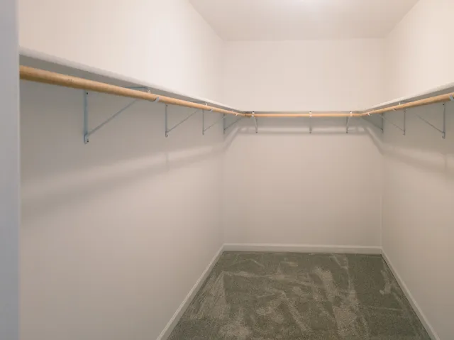 a view of a room with racks on the wall