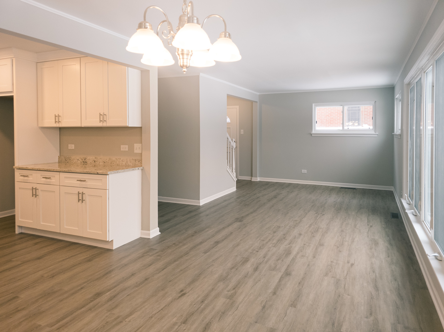 1904 South Fairview Avenue Park Ridge, IL 60068 - Photo 8 of 18 a view of a kitchen with wooden floor and a window