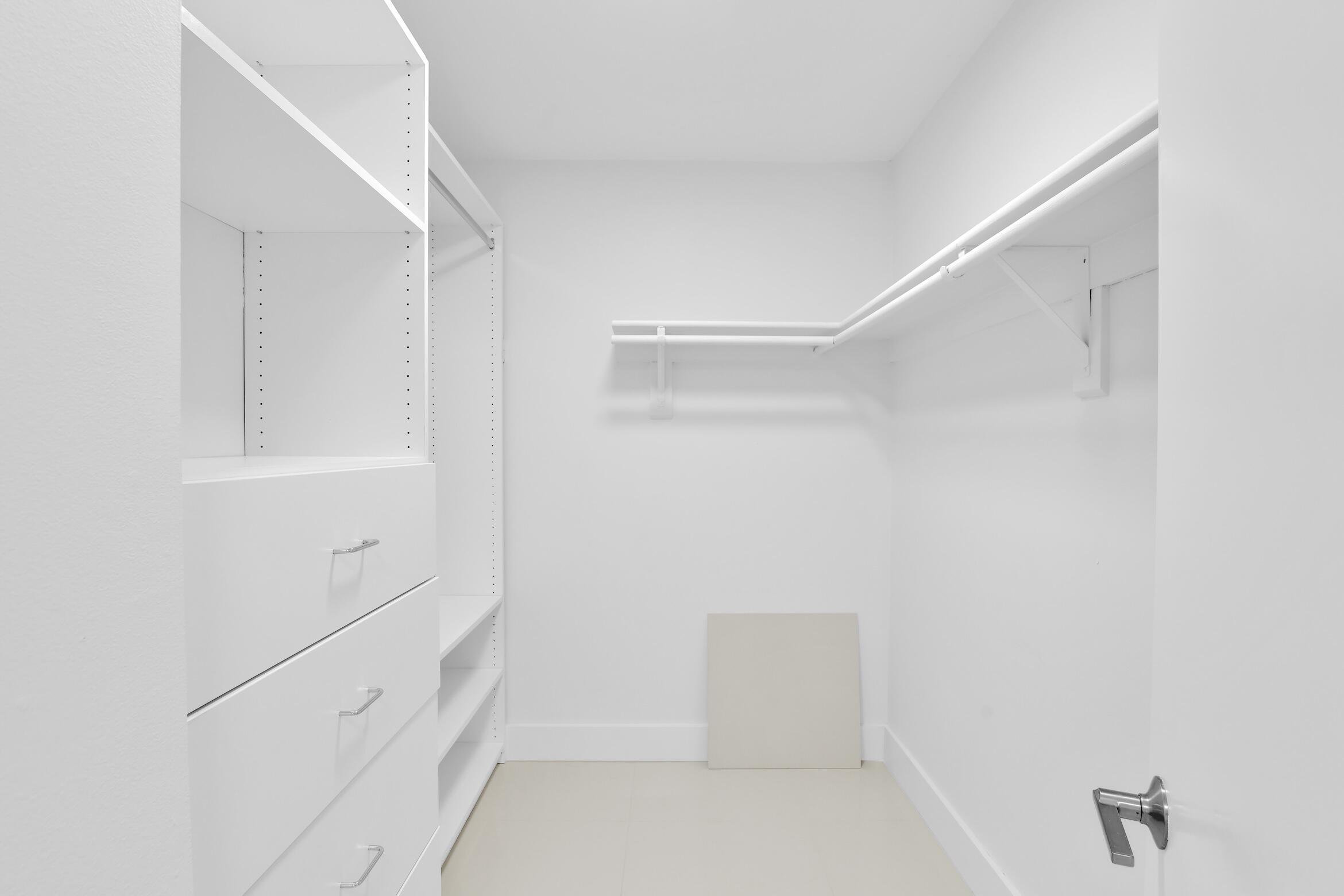 550 South Ocean Boulevard, Unit 403 Boca Raton, FL 33432 - Photo 17 of 55 a view of an empty walk in closet