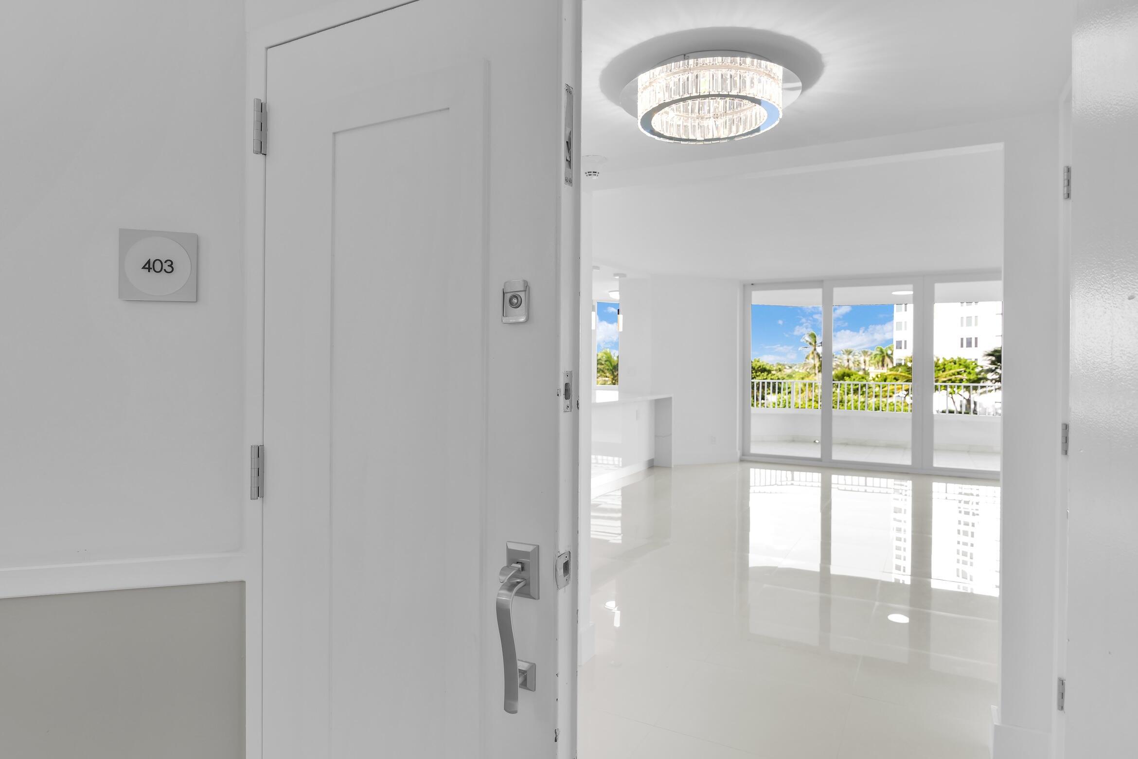 550 South Ocean Boulevard, Unit 403 Boca Raton, FL 33432 - Photo 8 of 55 a view of a room with wooden floor