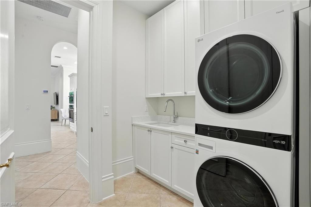 2547 Avila Lane Naples, FL 34105 - Photo 33 of 49 a utility room with dryer and washer