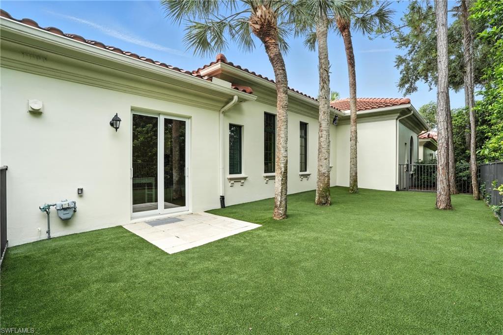 2547 Avila Lane Naples, FL 34105 - Photo 37 of 49 a view of an house with backyard space and garden