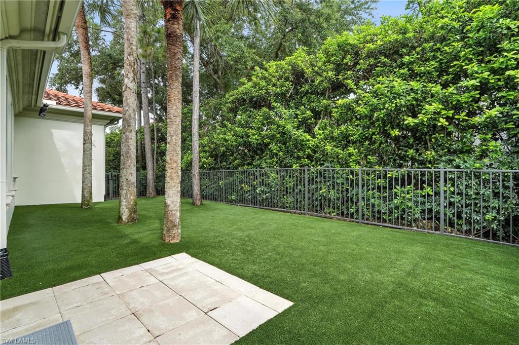 2547 Avila Lane Naples, FL 34105 - Photo 38 of 49 a view of a yard with plants