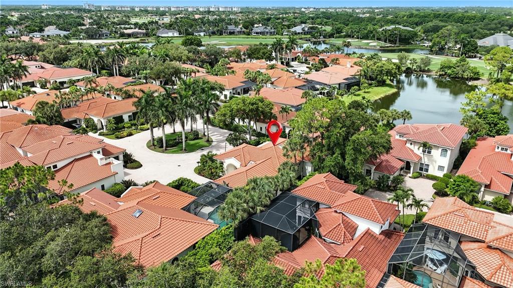 2547 Avila Lane Naples, FL 34105 - Photo 43 of 49 an aerial view of residential houses with outdoor space and lake view