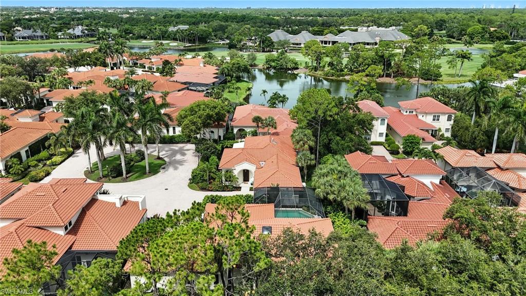 2547 Avila Lane Naples, FL 34105 - Photo 47 of 49 an aerial view of a city with lots of residential buildings
