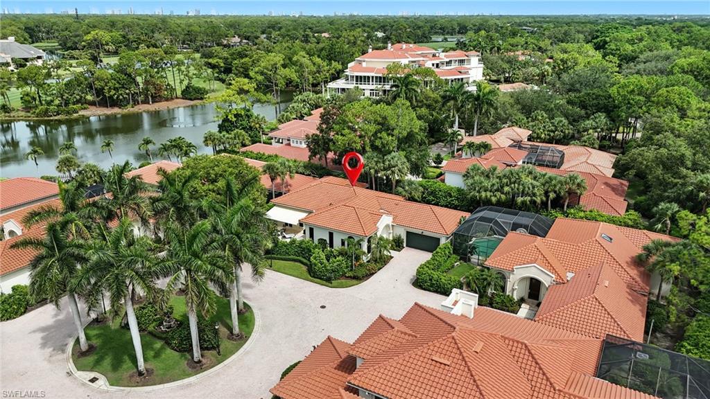 2547 Avila Lane Naples, FL 34105 - Photo 49 of 49 an aerial view of a house with a lake view