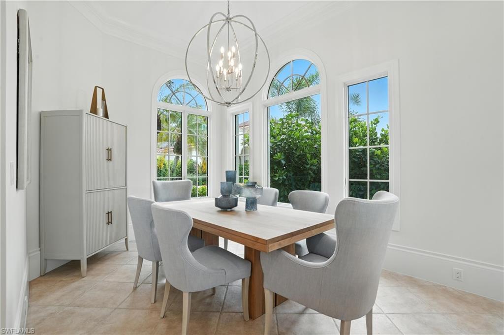 2547 Avila Lane Naples, FL 34105 - Photo 5 of 49 a view of a dining room with furniture window and outside view