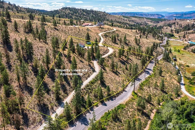 a view of a city with mountains