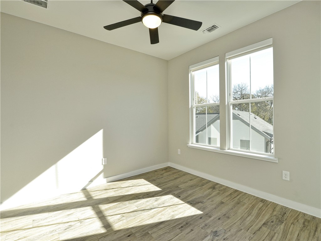3809 Valley View Road, Unit 15 Austin, TX 78704 - Photo 22 of 30 a view of an empty room and window