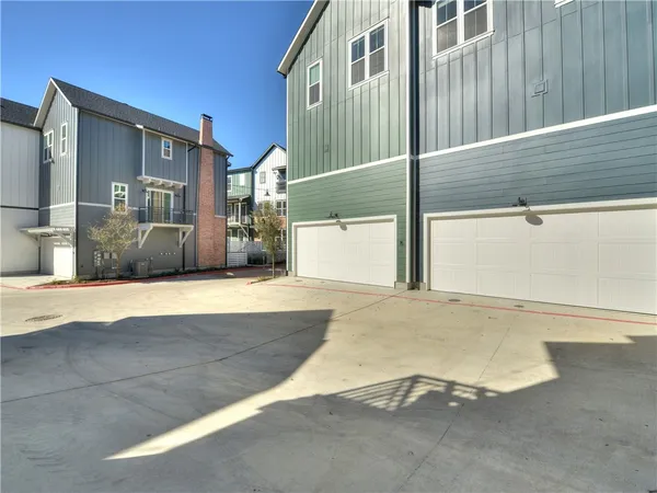 a view of a backyard with a garden