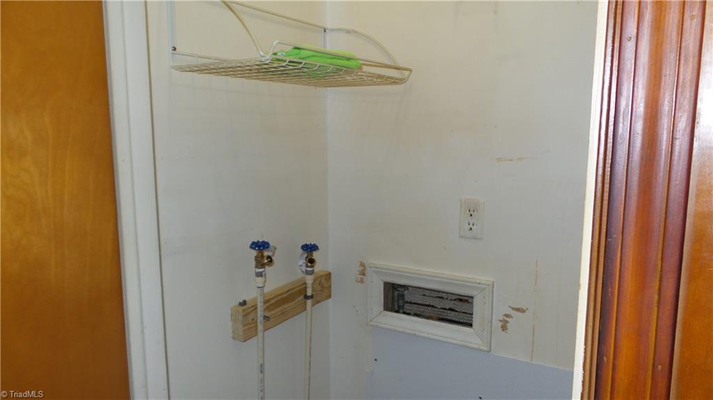 2107 Scott Road Browns Summit, NC 27214 - Photo 20 of 28 Laundry closet with washer hookup