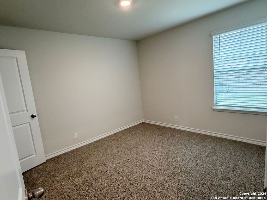 607 Fluted Cibolo, TX 78108 - Photo 21 of 50 an empty room with a window