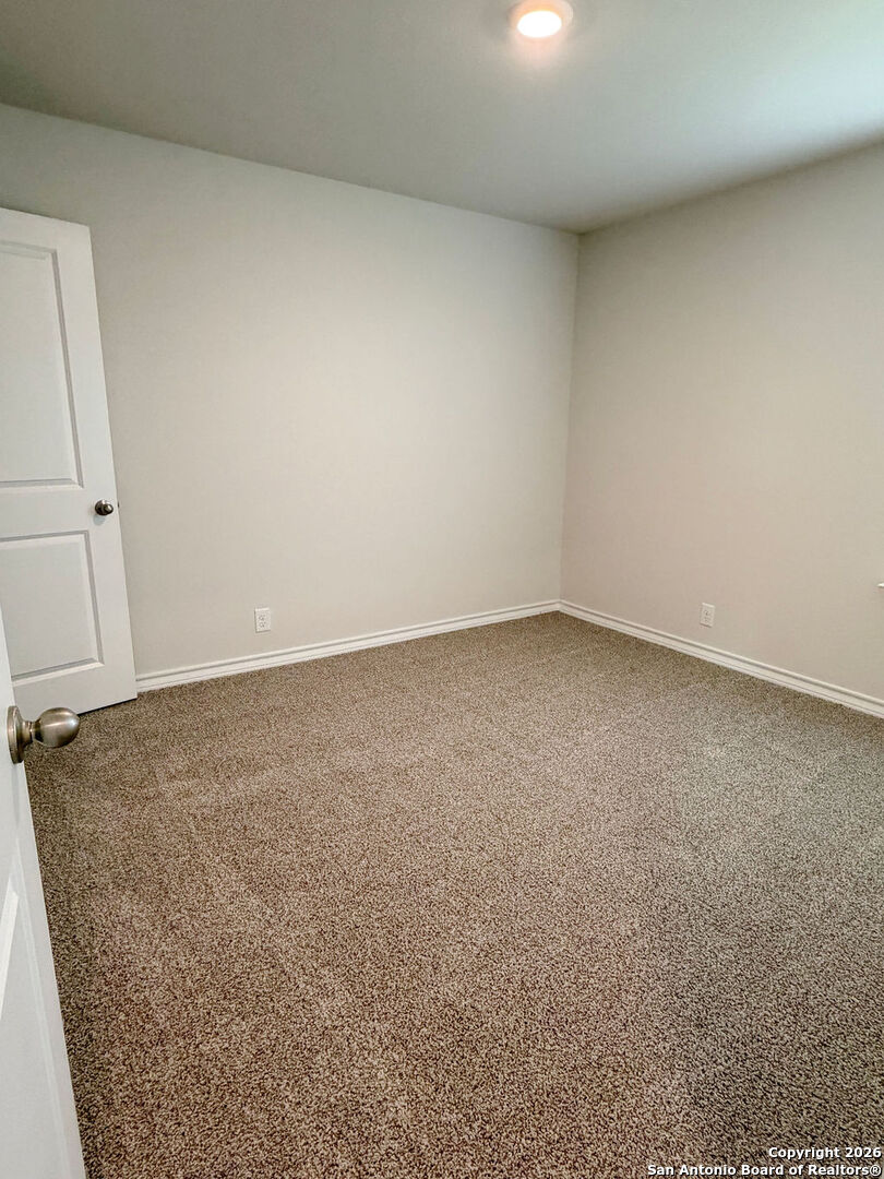607 Fluted Cibolo, TX 78108 - Photo 22 of 50 an empty room with an entryway