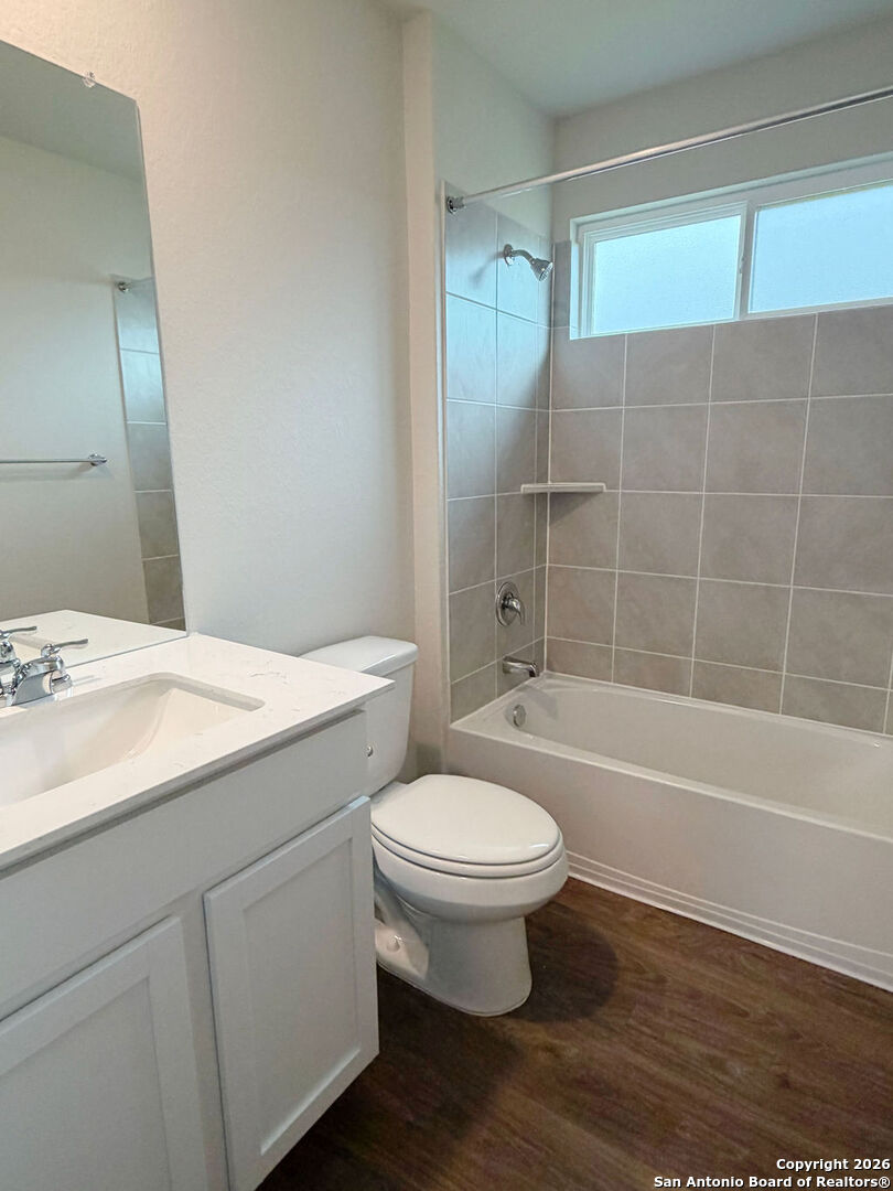 607 Fluted Cibolo, TX 78108 - Photo 23 of 50 a bathroom with a sink toilet and shower