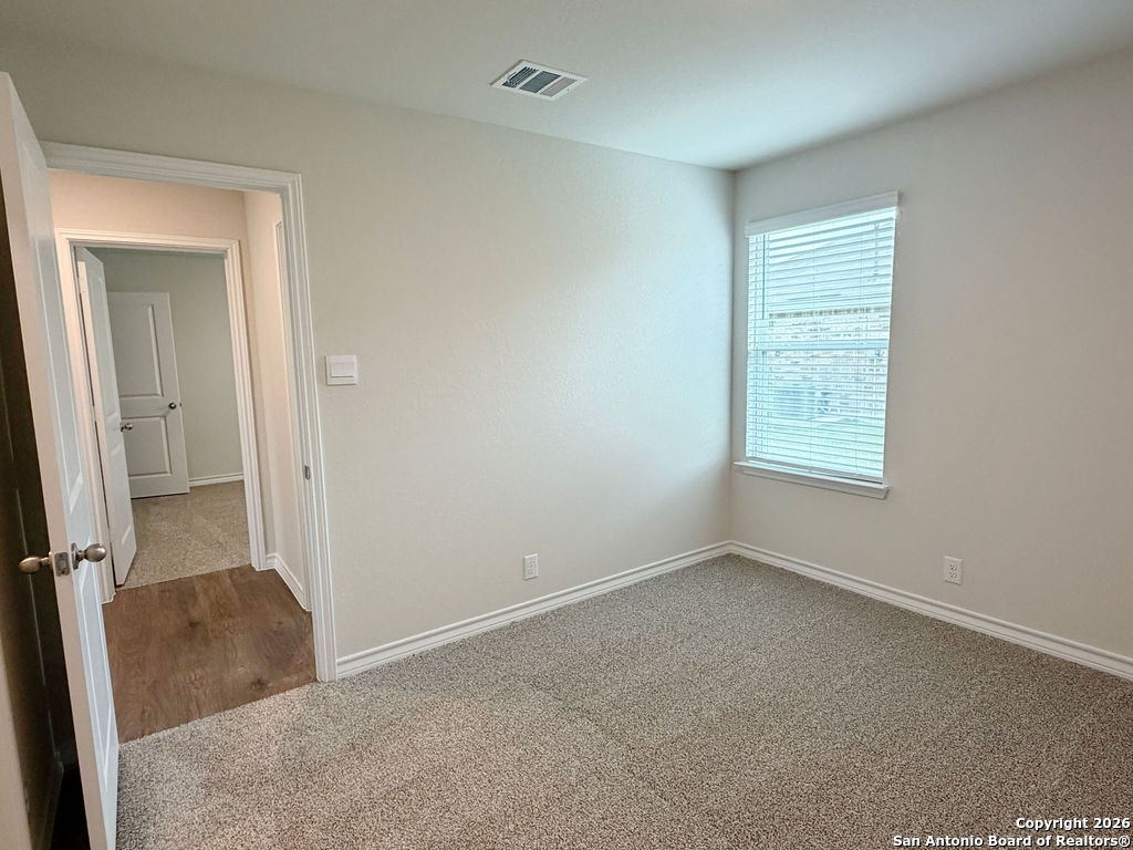 607 Fluted Cibolo, TX 78108 - Photo 25 of 50 an empty room with windows