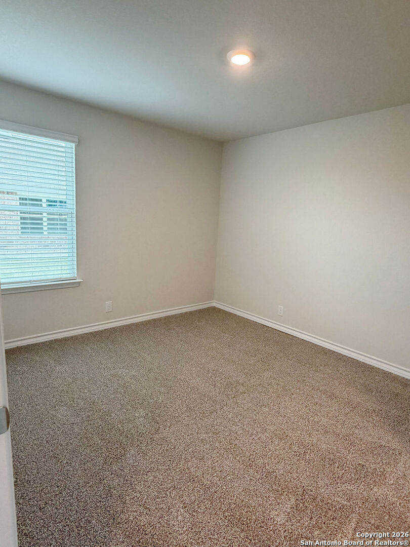 607 Fluted Cibolo, TX 78108 - Photo 26 of 50 an empty room with a window