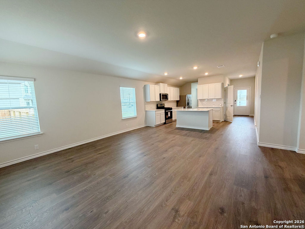 607 Fluted Cibolo, TX 78108 - Photo 30 of 50 a view of kitchen with kitchen island sink and center island