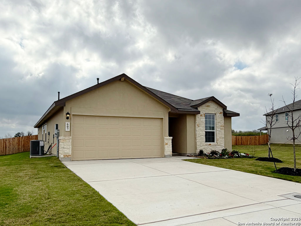 607 Fluted Cibolo, TX 78108 - Photo 3 of 50 a view of backyard of the house