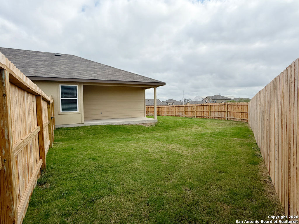 607 Fluted Cibolo, TX 78108 - Photo 49 of 50 a backyard of a house with lots of green space