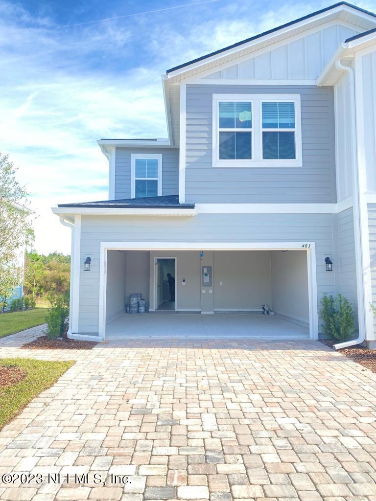 a front view of house with yard