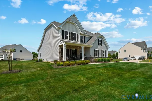 a front view of house with yard