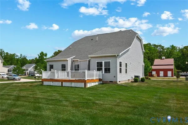 a front view of house with a garden