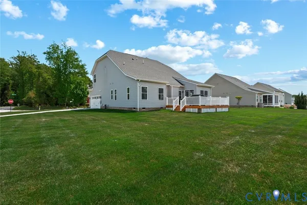 a view of a house with a big yard