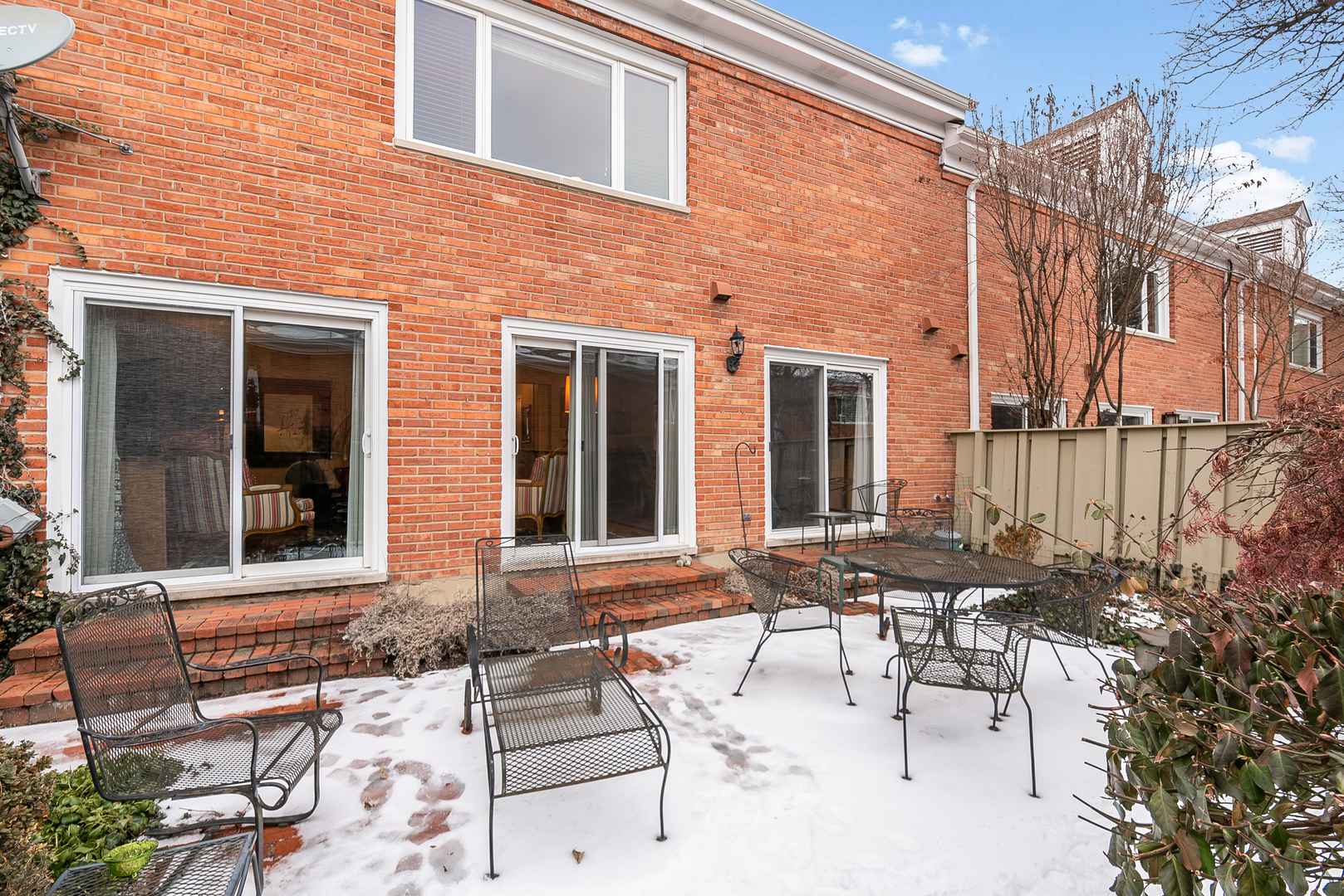 731 Raleigh Court Northbrook, IL 60062 - Photo 16 of 23 a patio with a table and chairs