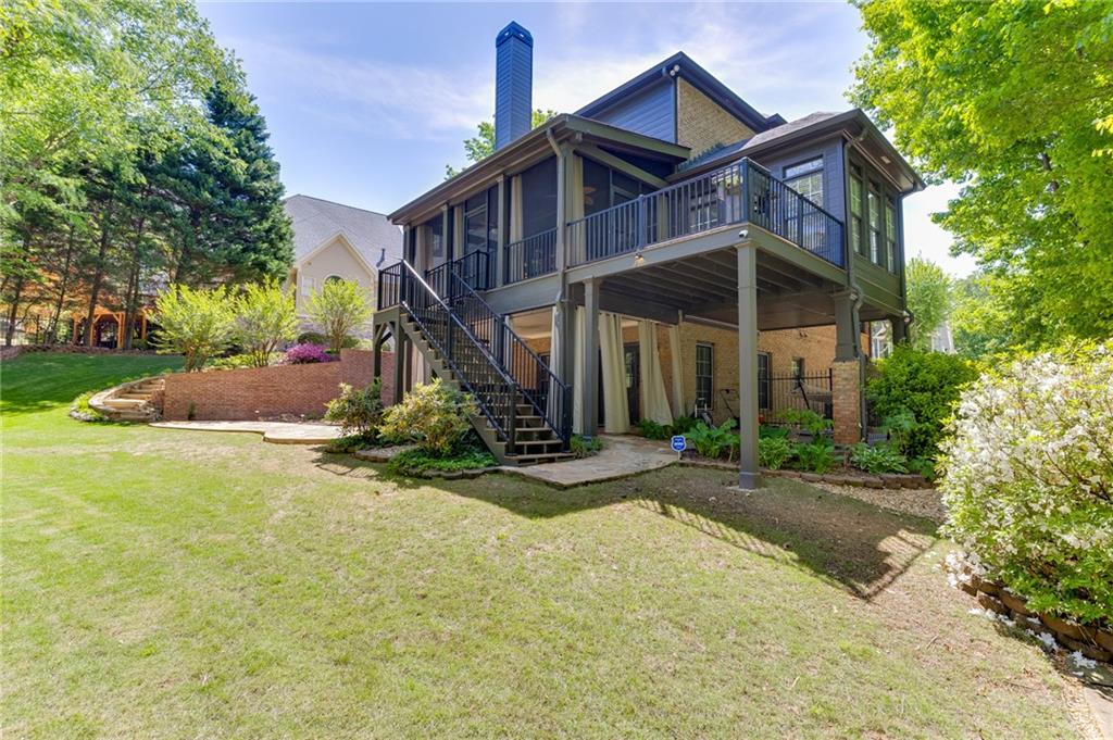 2758 Pathview Drive Dacula, GA 30019 - Photo 45 of 48 a front view of a house with yard and trees