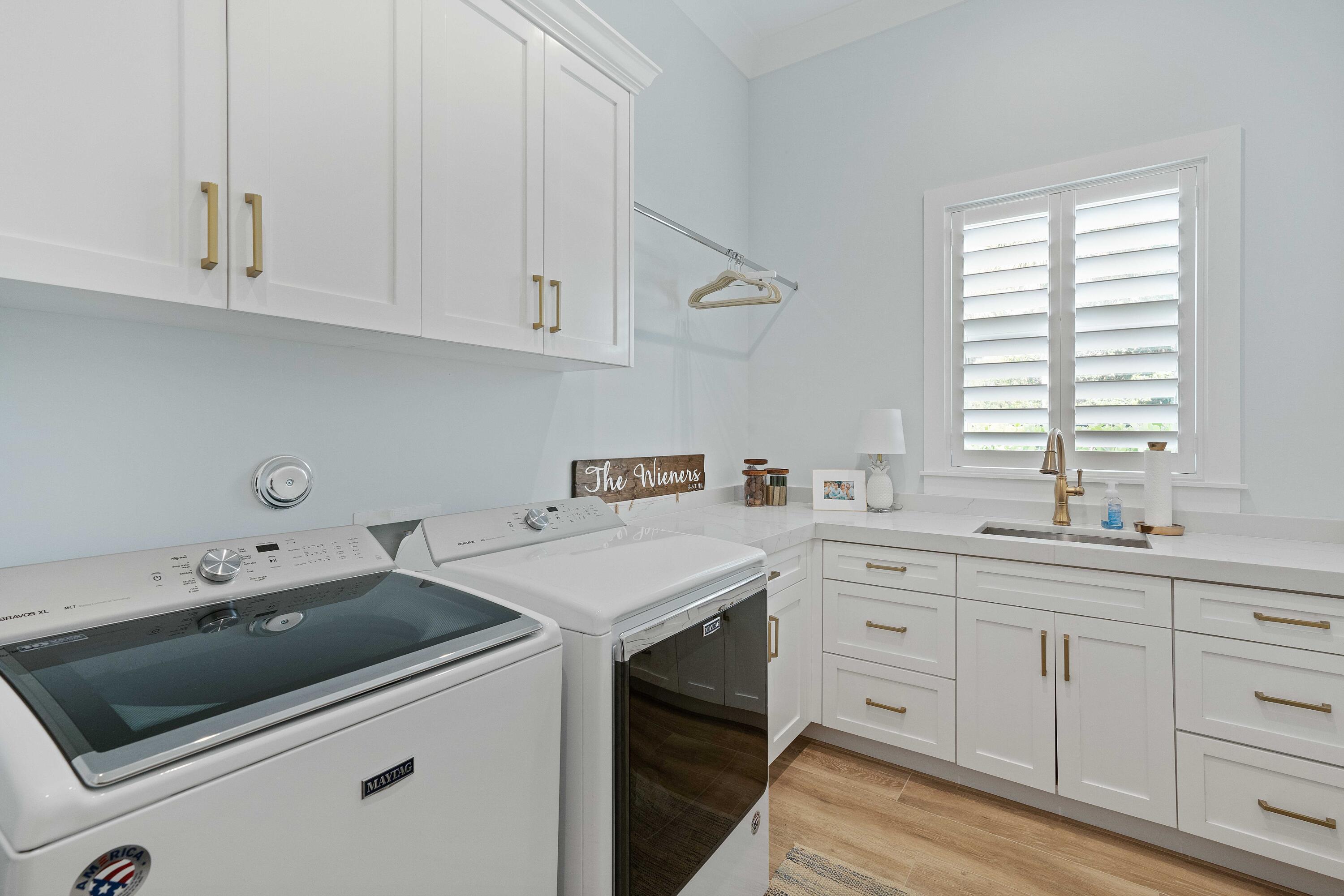 261 Old Jupiter Beach Road Jupiter, FL 33477 - Photo 30 of 97 1st Floor Laundry