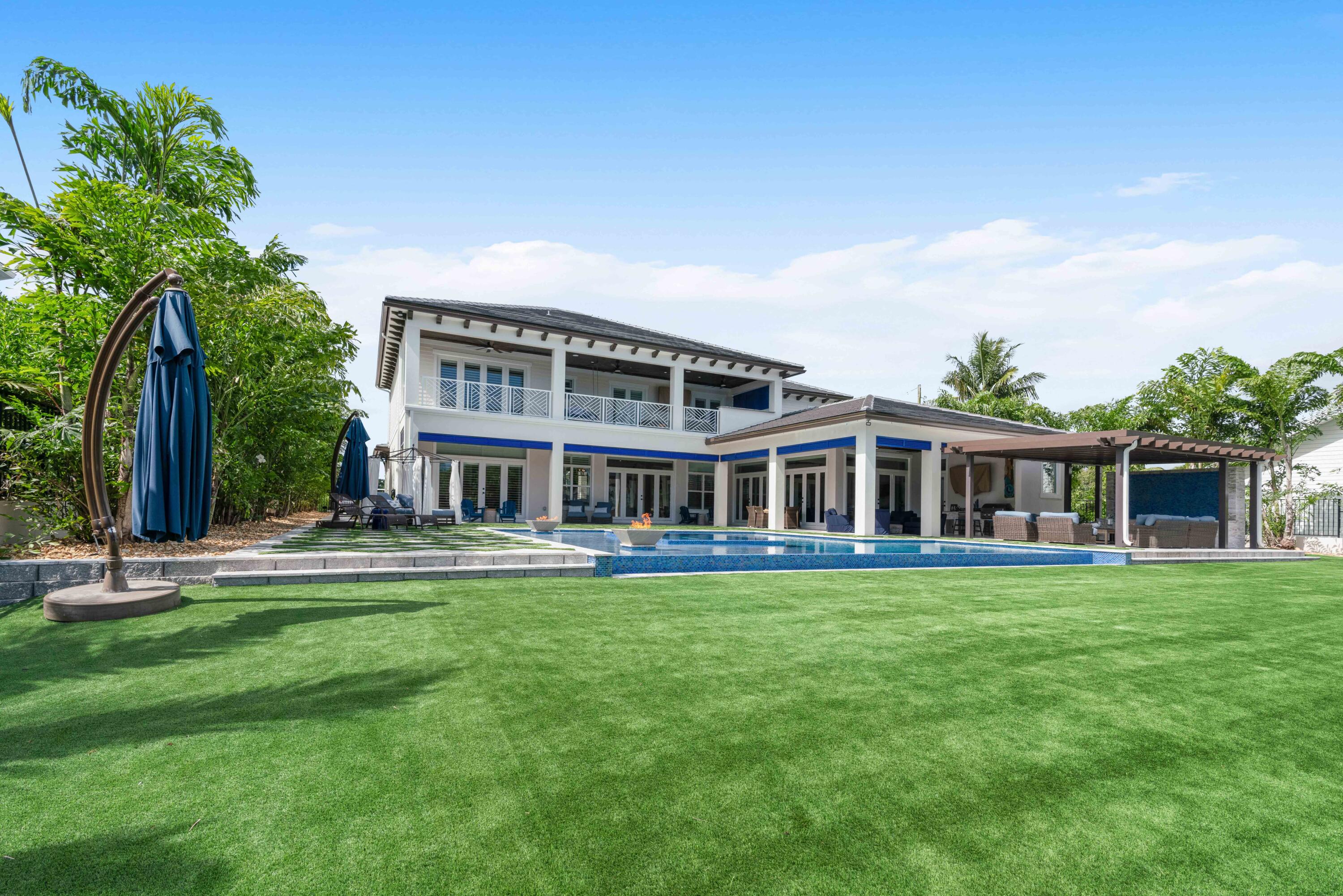 261 Old Jupiter Beach Road Jupiter, FL 33477 - Photo 74 of 97 Turf Backyard