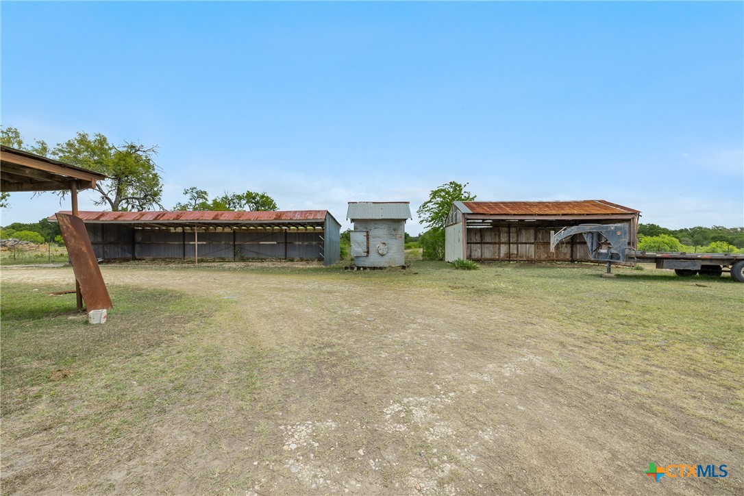 9765 State Park Road Lockhart, TX 78644 - Photo 12 of 40 a view of house with outdoor space and sitting area