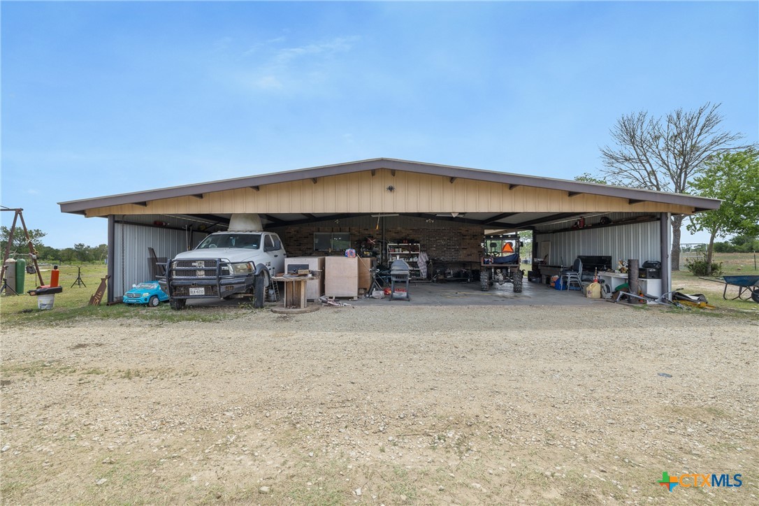 9765 State Park Road Lockhart, TX 78644 - Photo 7 of 40 a view of a car park in front of house