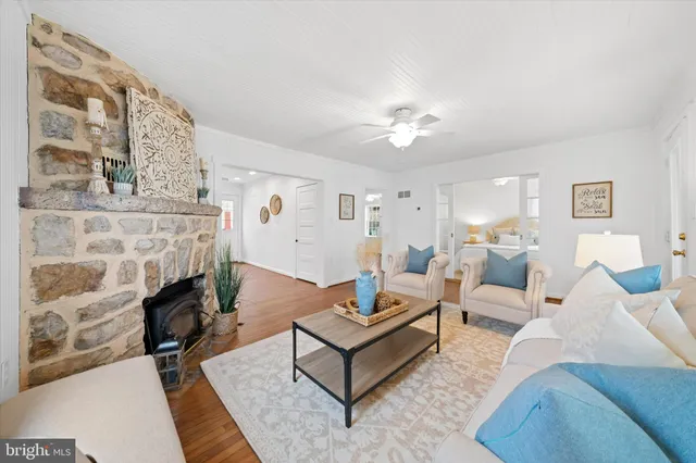 a bedroom with a bed and a large mirror