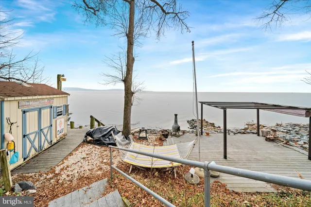 a view of a balcony with chairs