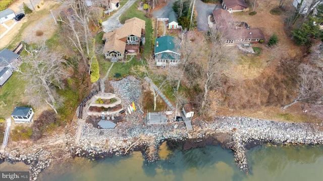a view of balcony with wooden floor and seating space