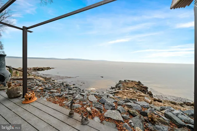 a view of a lake from a balcony