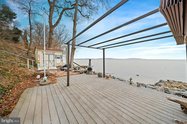 an aerial view of a house with outdoor space