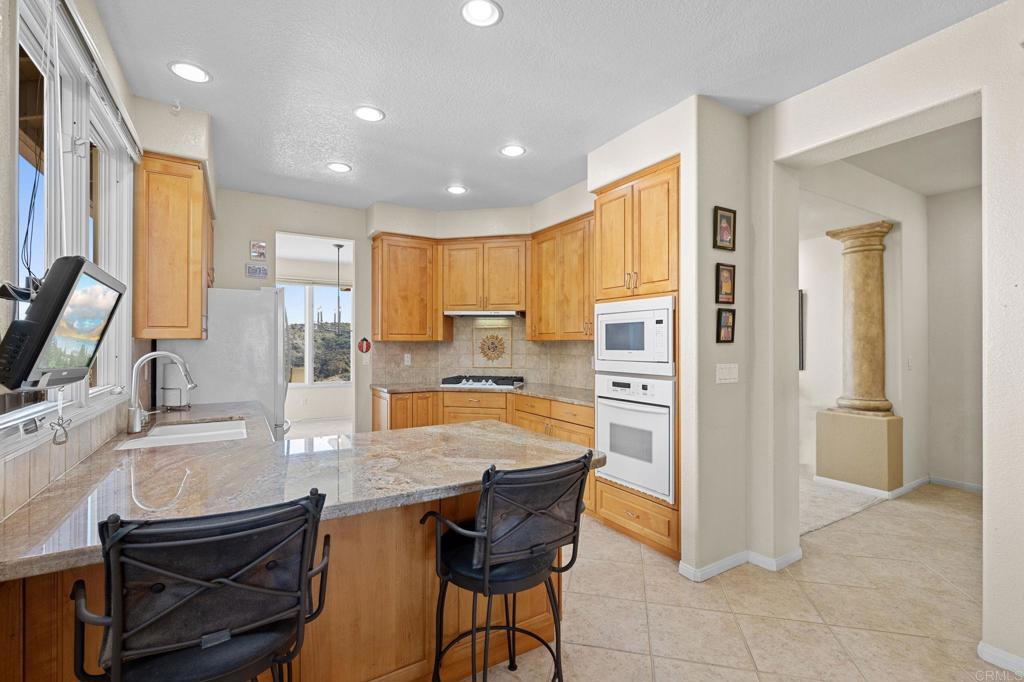 1827 Amalfi Drive Encinitas, CA 92024 - Photo 12 of 31 a dining table and chairs